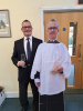 Rob Horton celebrates his birthday with a glass of fizz for everyone after the service